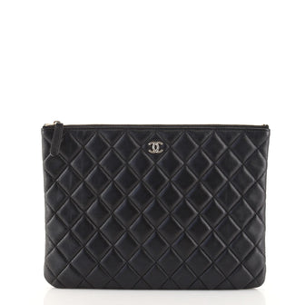 Chanel O Case Clutch Quilted Lambskin Medium