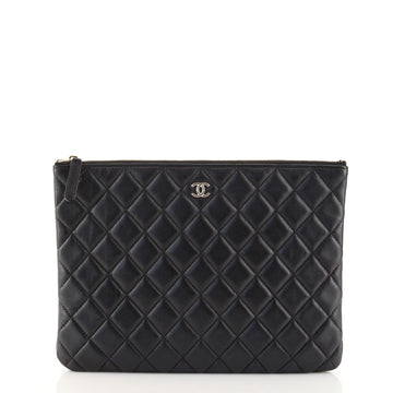 Chanel O Case Clutch Quilted Lambskin Medium